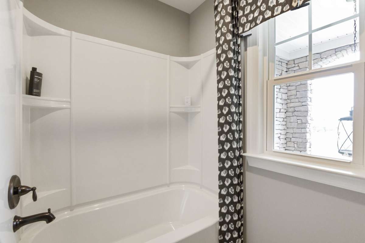 Jack and Jill bathrooms upstairs. Photos are of model home.