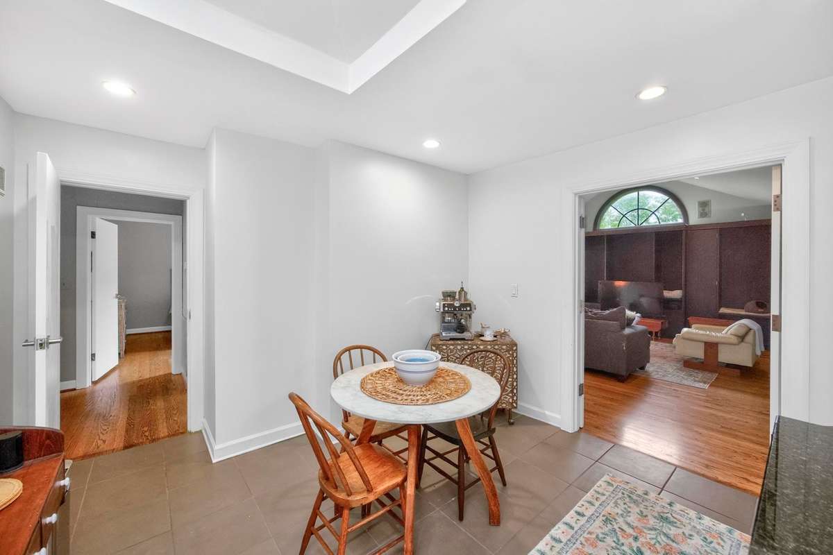Kitchen leading into the living room/den