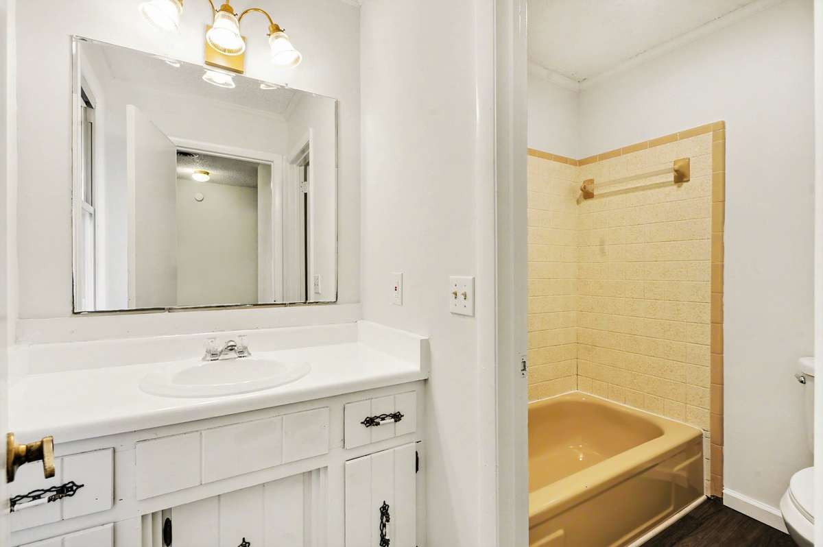 The hall bathroom has a well designed separation between the wet areas.