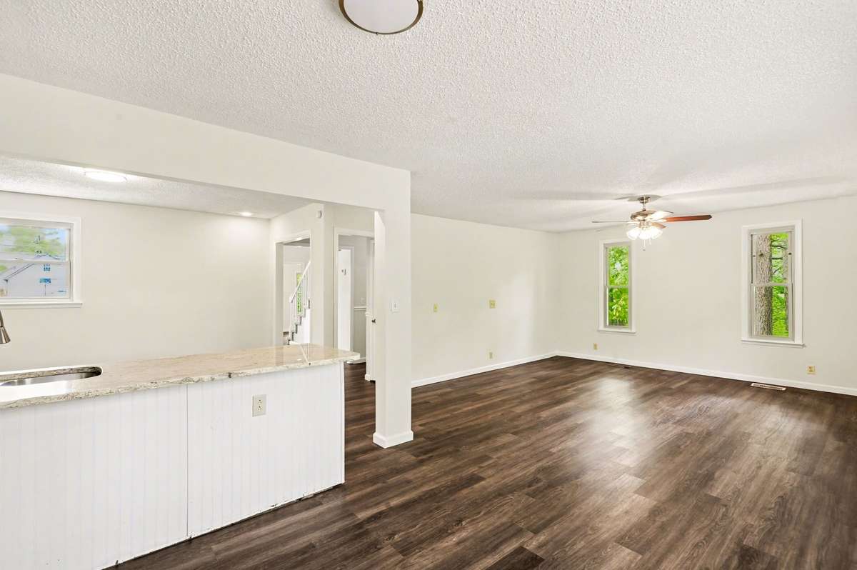 The main living space features and open concept living room, dining room and kitchen.