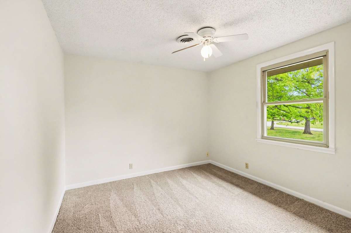 All carpets are brand new! You can't beat the feeling of being in the woods that this house provides!