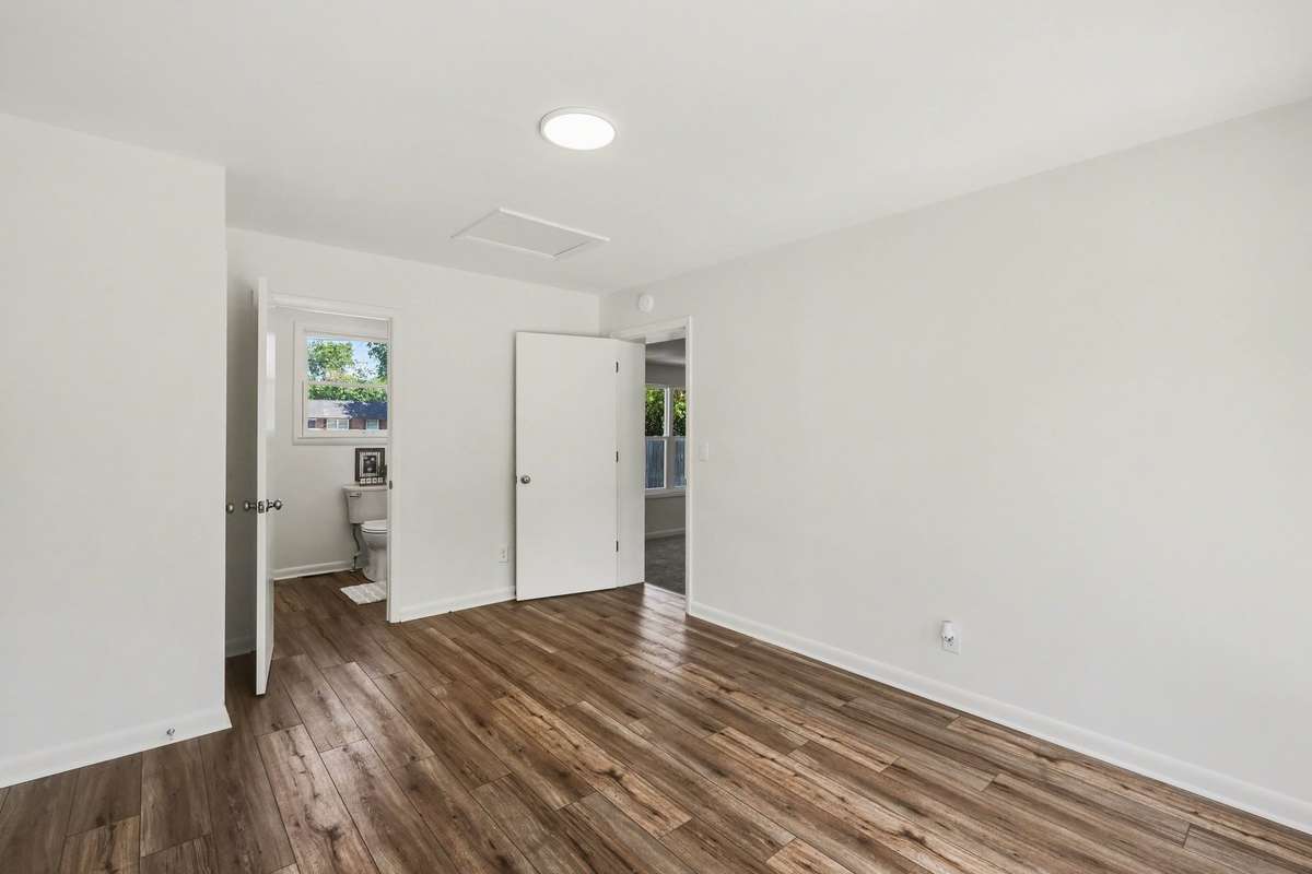 Another view of the Family/Bonus Room with view if the Full Bath with Laundry connections