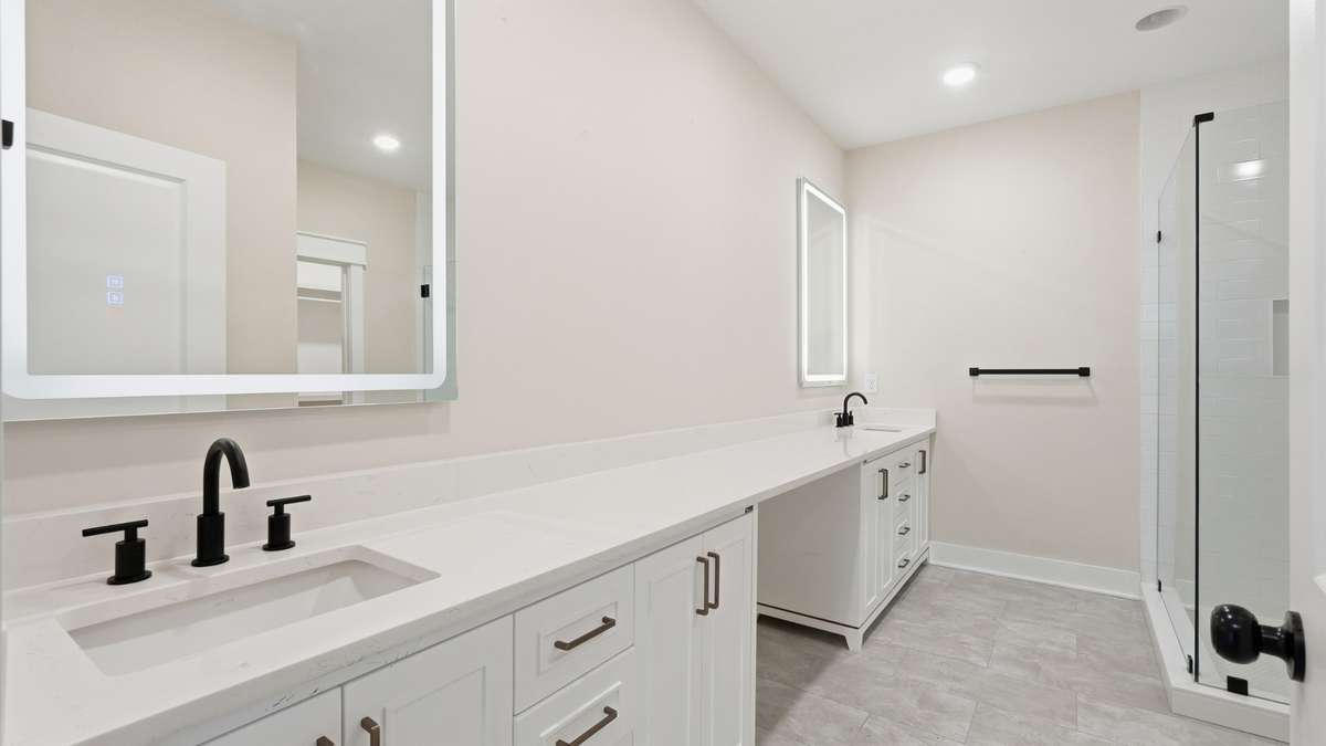Oversized double vanity in primary bathroom