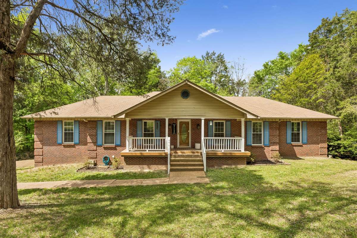 Tucked into a peaceful, wooded setting this home offers the kind of privacy and charm that’s hard to find—your own quiet retreat, just minutes from it all.