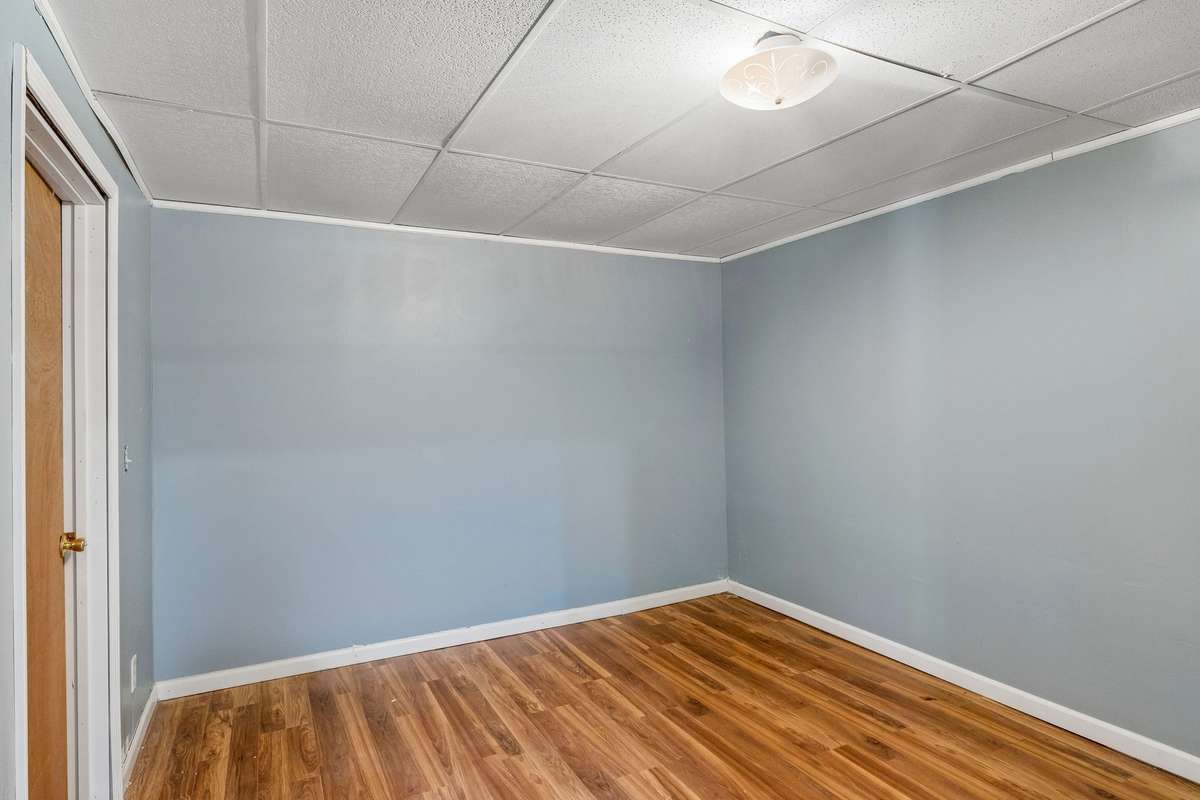 This flex room could be used as a second bedroom in the basement if need.