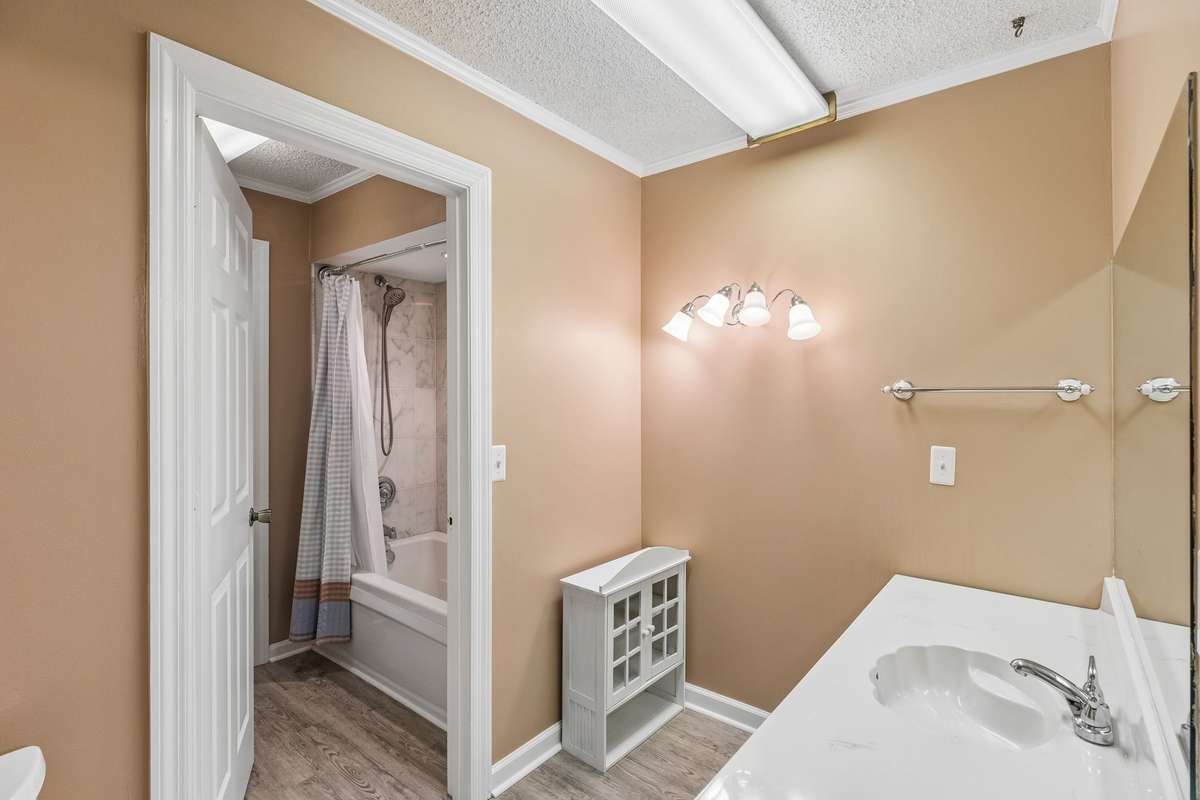 Jack-and-jill bathroom situated between the two guest rooms on the main floor.