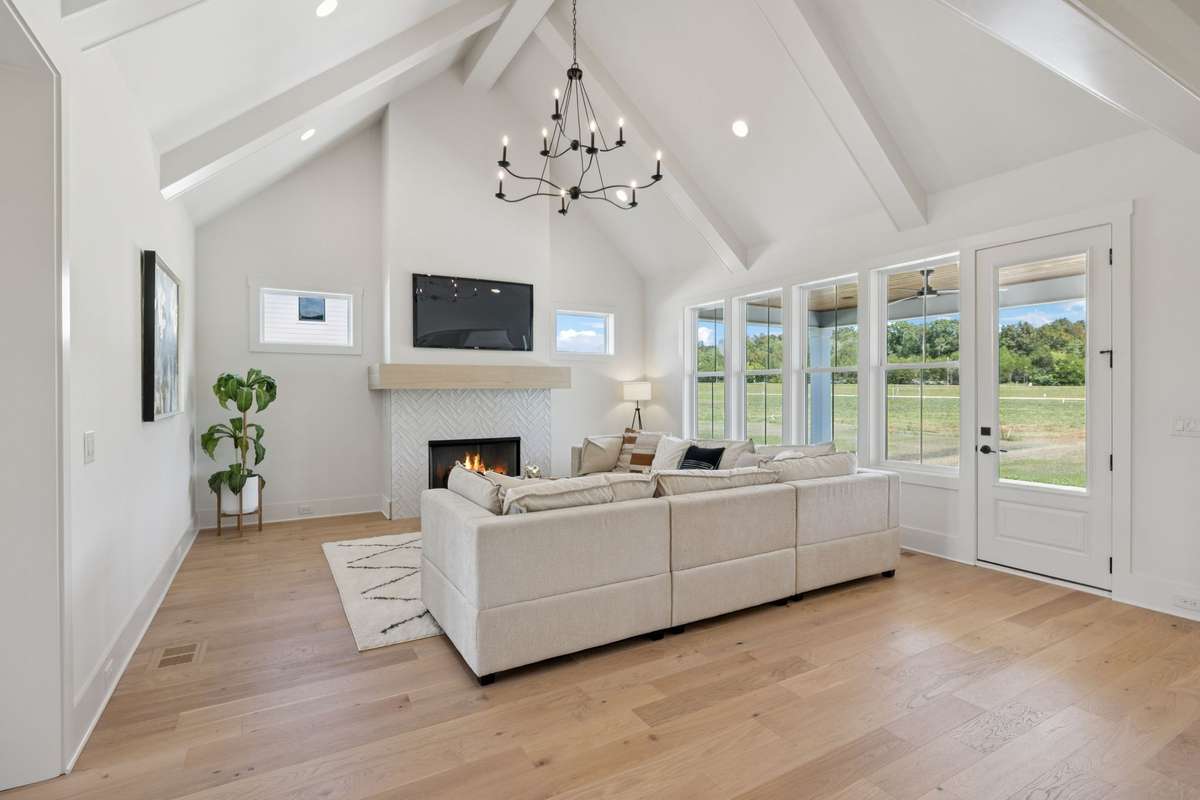 Spacious Great Room With Vaulted Ceiling and Cozy Fireplace -  Look At The Natural Light!