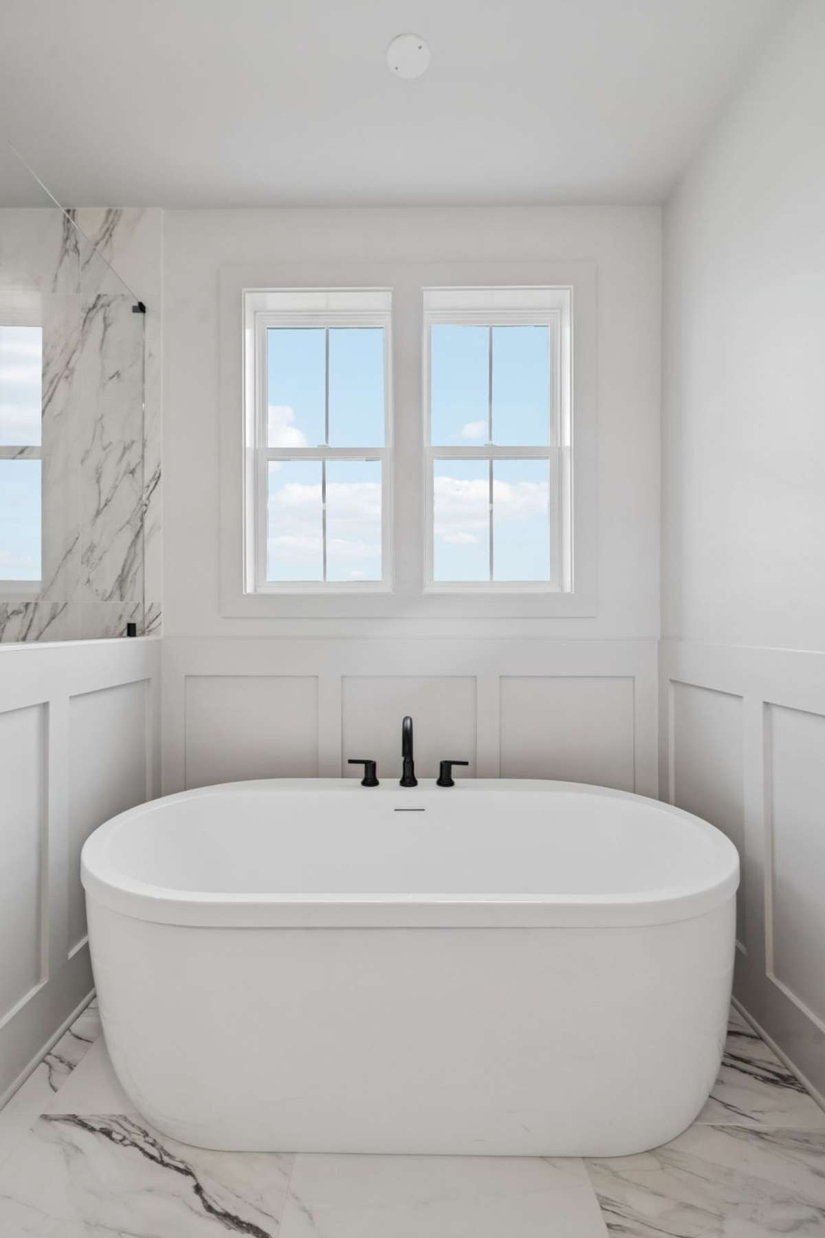 So many details- from the window placement to the board and batten wall design