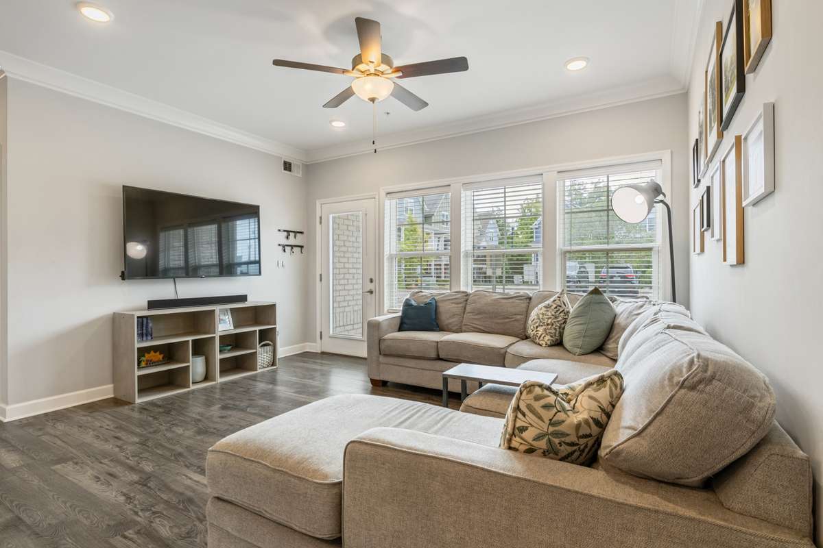 This large living room even accomodates a full size sectional to make sure everyone is comfortable and has a place to hang!