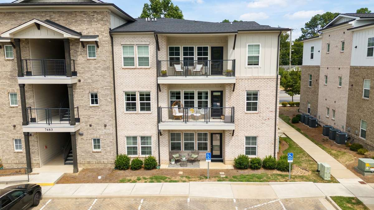 First Floor Unit gives you easy patio access from your dedicated parking space. This unit is located on the quieter parking lot side and looks into the community.