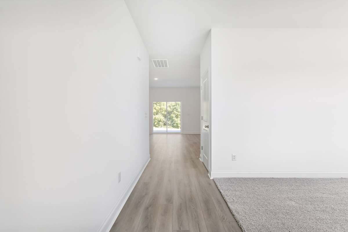 Westmore entry. Photo is of similar home, same plan. Options may vary.