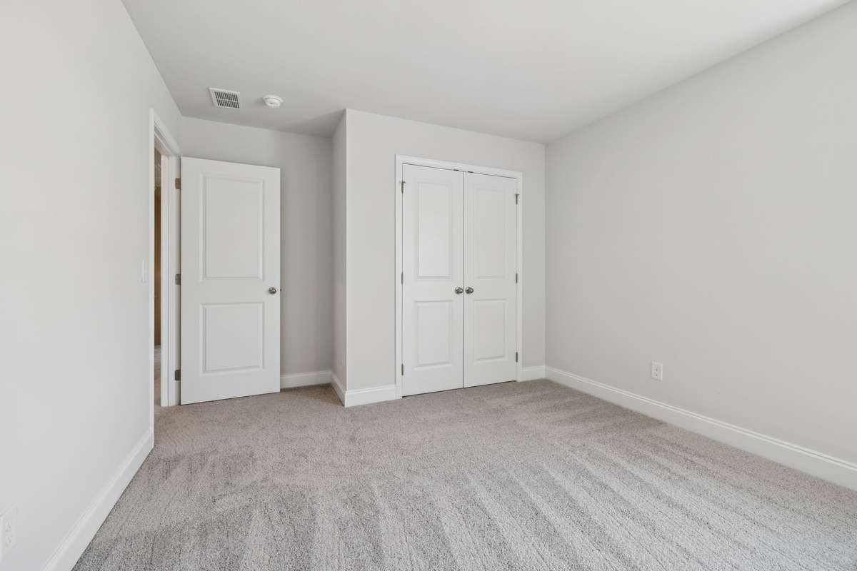 Westmore bed 3. Photo is of similar home, same plan. Options may vary.