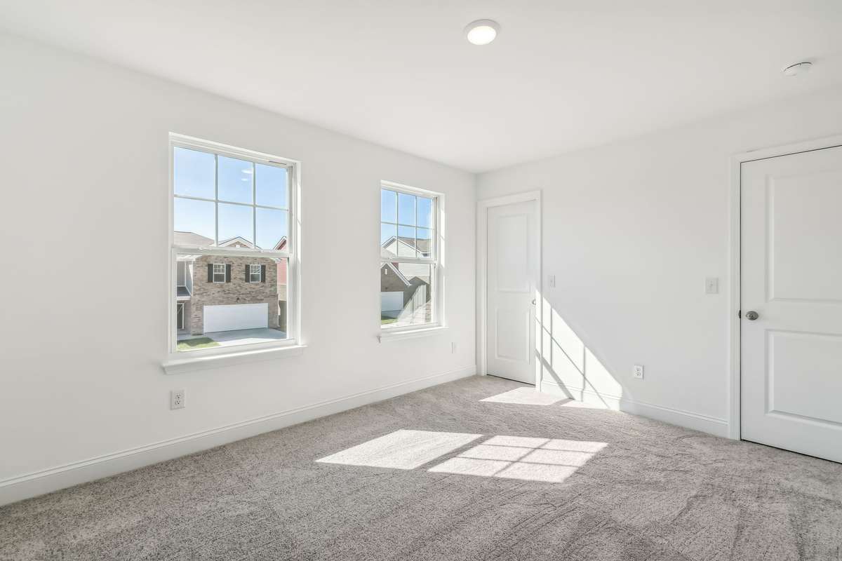 Westmore bed 3. Photo is of similar home, same plan. Options may vary.