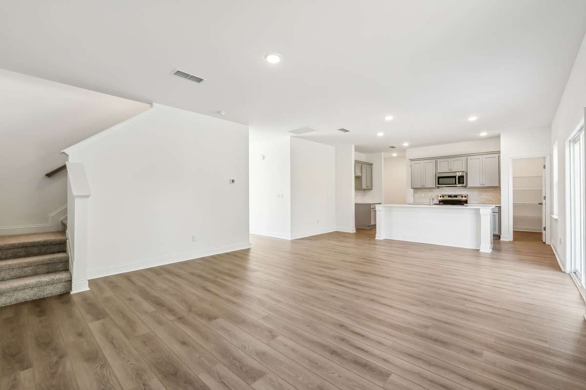 Westmore living and kitchen. Photo is of similar home, same plan. Options may vary.