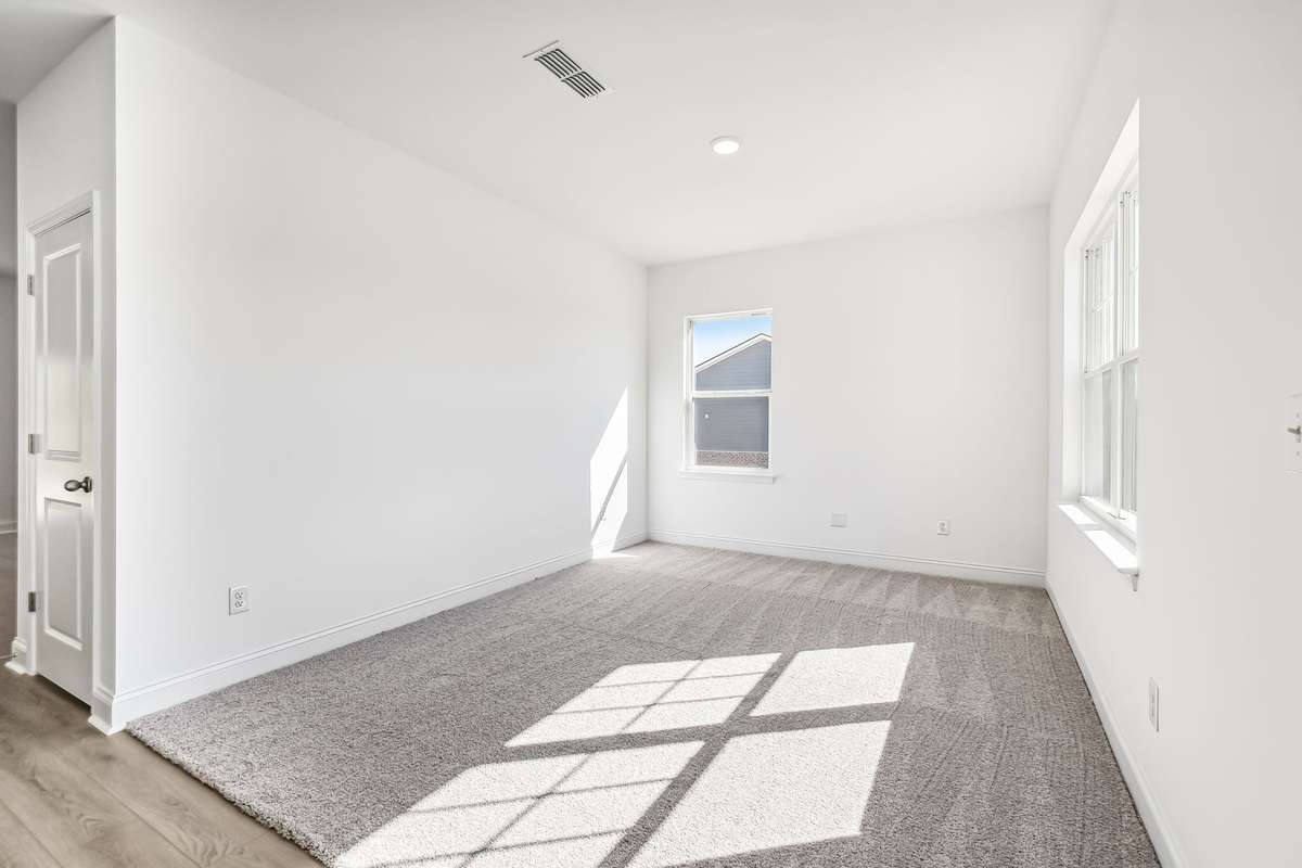 Westmore flex space. Photo is of similar home, same plan. Options may vary. No carpet in actual flex space.