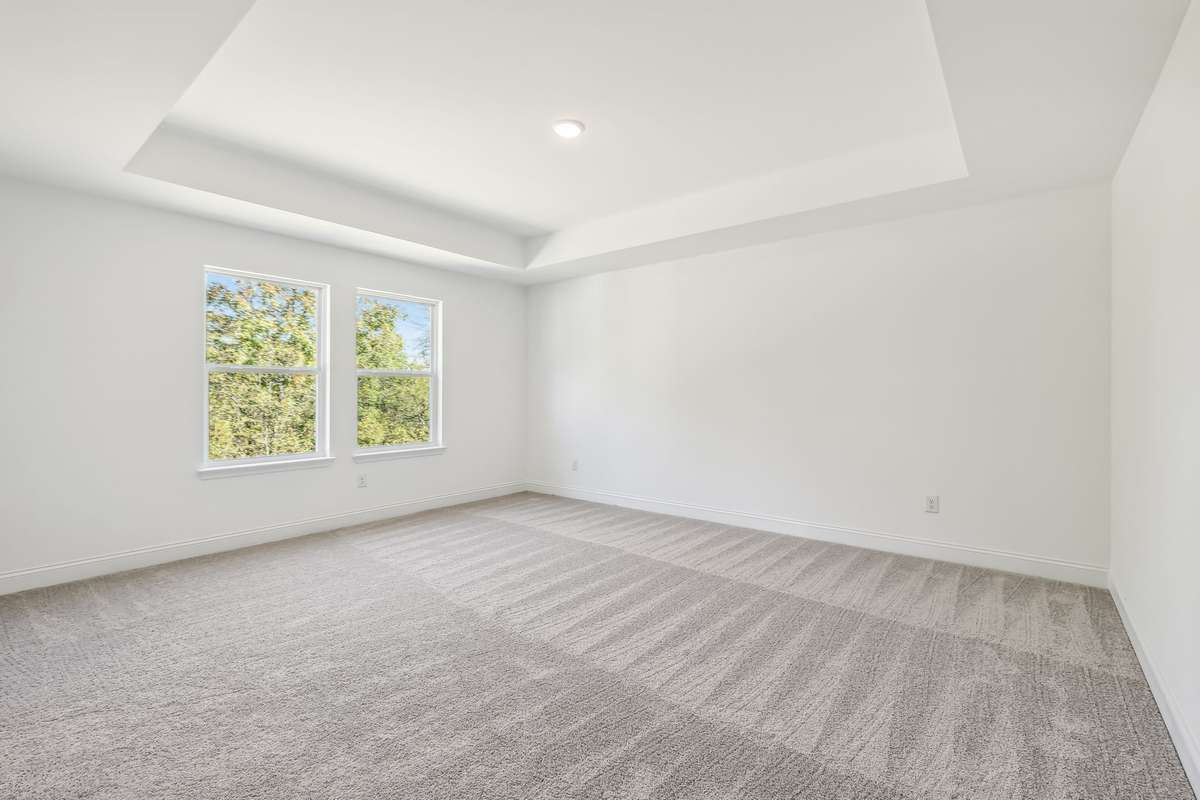 Westmore primary bedroom. Photo is of similar home, same plan. Options may vary.