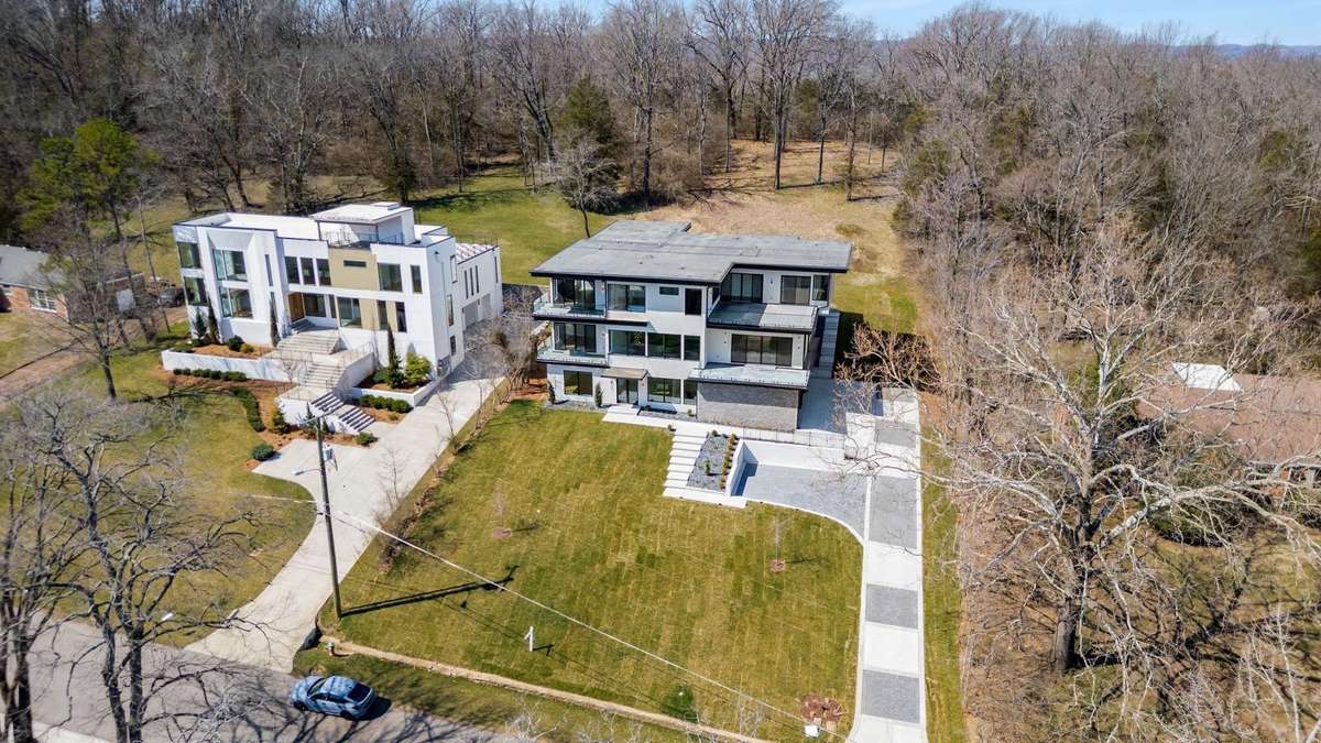 The land in the clearing at the top of the hill is part of the property. There are so many amazing opportunities for this area and you will not find lots like this that have flexible Metro zoning elsewhere in Belle Meade