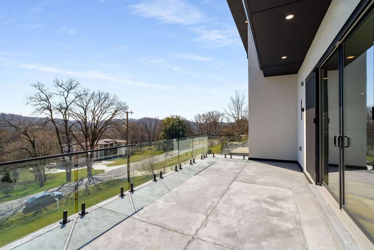 Elevated concrete deck off the main living room with views for miles.