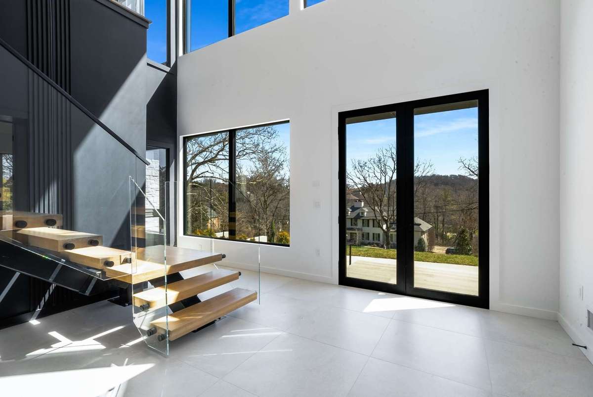 More than a foyer, this is a grand, two story reception that must be experienced
