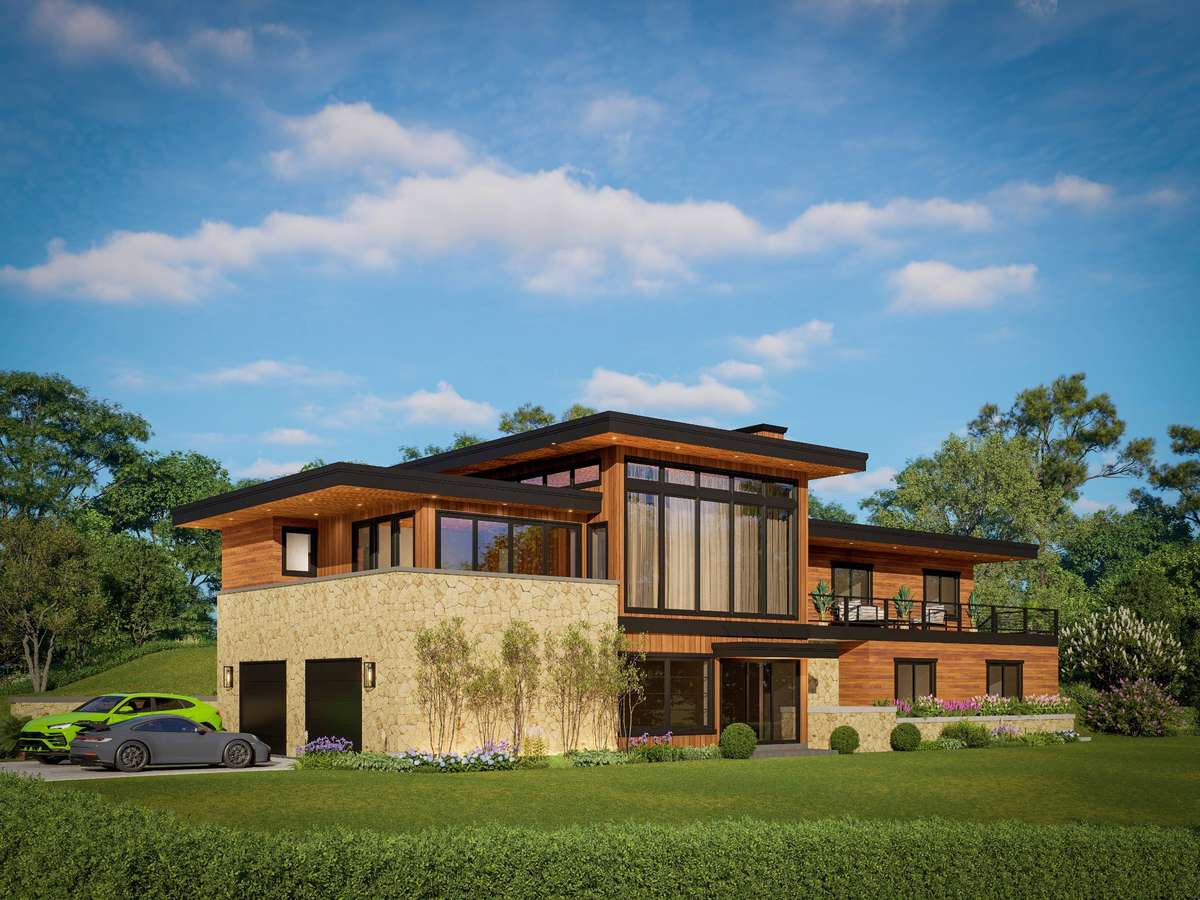 Rear view of home--tons of windows to overlook the gorgeous wooded lot, overlooking the hollow below.
