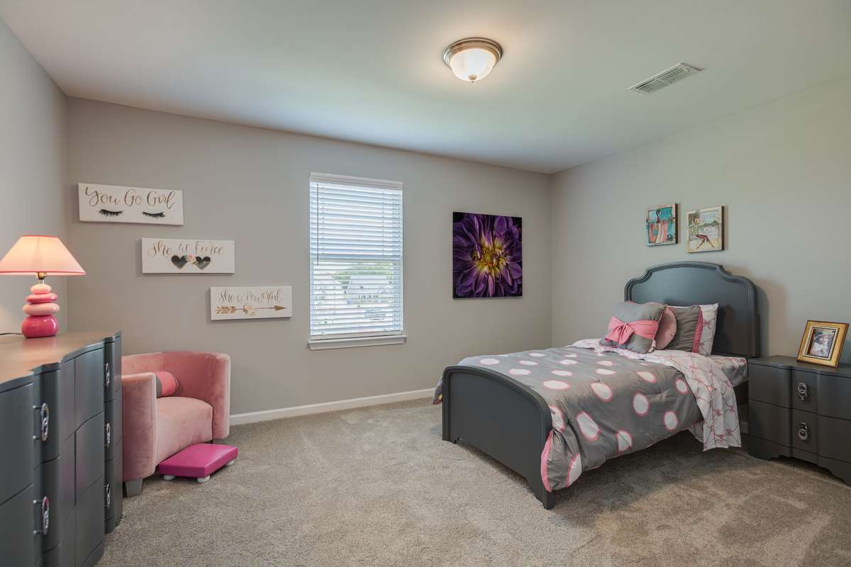 Stock Photo: Secondary Bedroom upstairs with a HUGE closet & attic storage space!