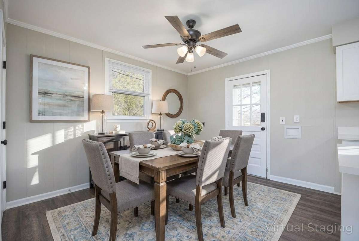 Virtually staged to show the dining area