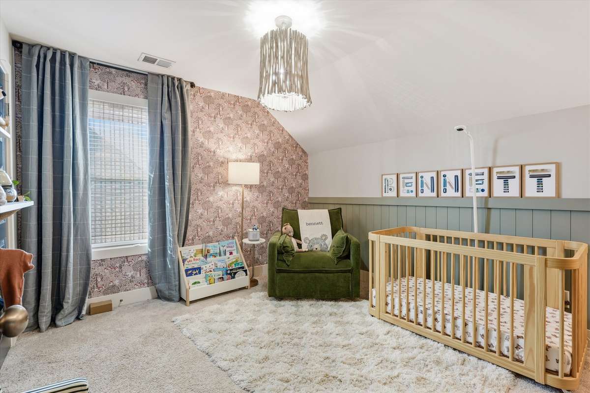 2ND LEVEL BEDROOM WITH CUSTOM WALLPAPER AND WAINSCOTING DETAIL
