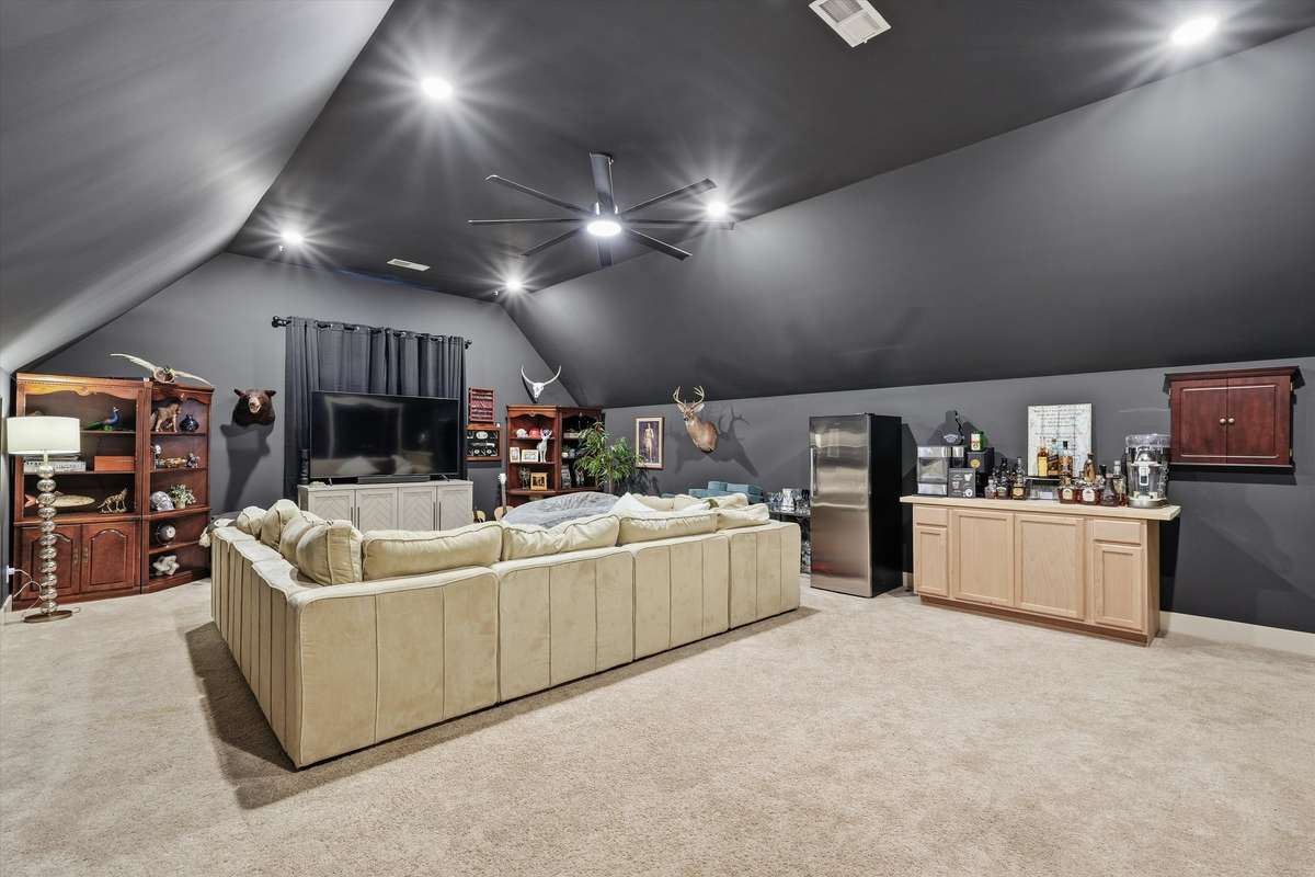 OVERSIZED BONUS ROOM! CURRENTLY USED AS A MEDIA ROOM BUT PERFECT FOR MOVIE NIGHTS, A PLAY ROOM OR JUST ANOTHER LIVING SPACE
