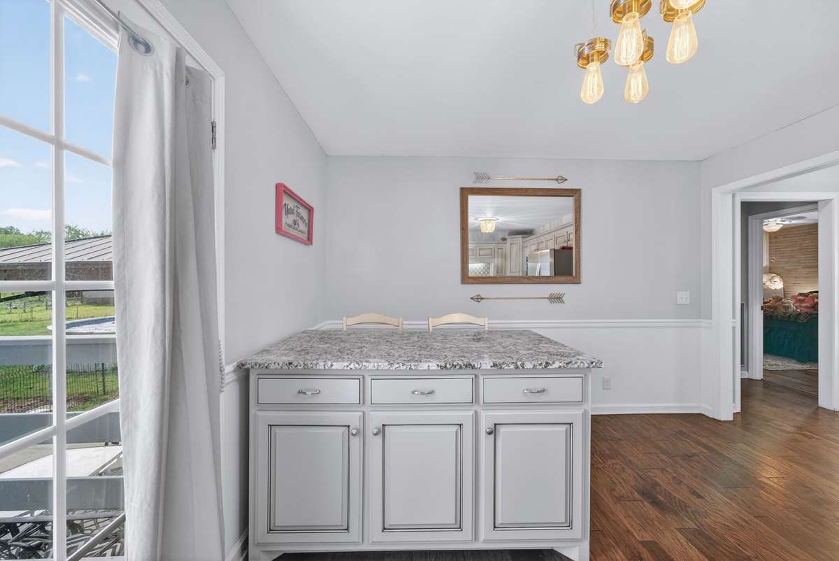 Bar is great for dining, serving while entertaining guests and provides extra kitchen storage