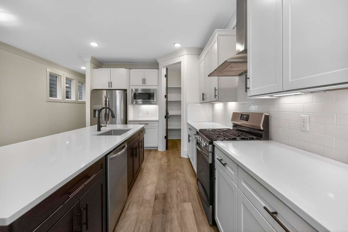 A gas range makes this kitchen a pleasure to cook in.