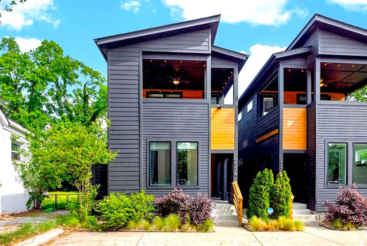 217 Eastmoreland Street lies in the vibrant and diverse neighborhood of Highland Heights, bordering Cleveland Park to the south. These two homes, with their striking modern exteriors, are just minutes away from downtown Nashville.