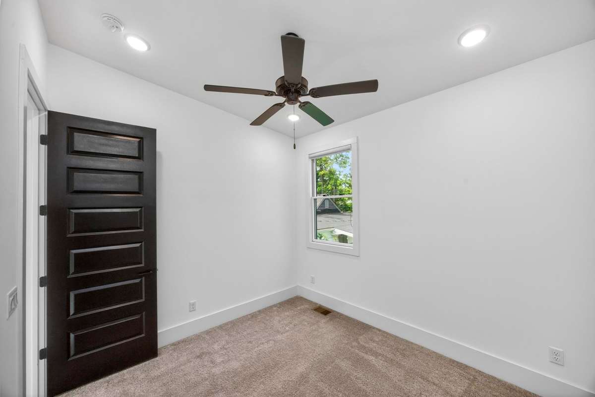 One of the three bedrooms on the second level.