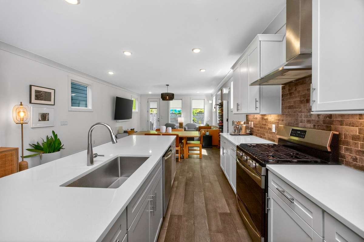 A gas range makes this kitchen a pleasure to cook in.