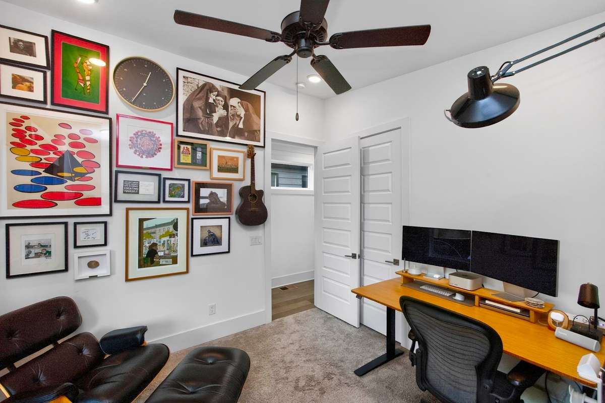The third bedroom, currently in use as a home office.