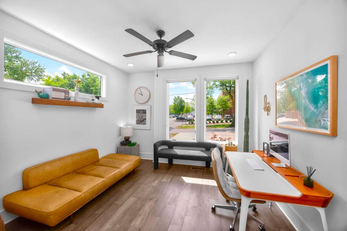 This main level bedroom offers flexibilty as a guest room or for use as a private office.