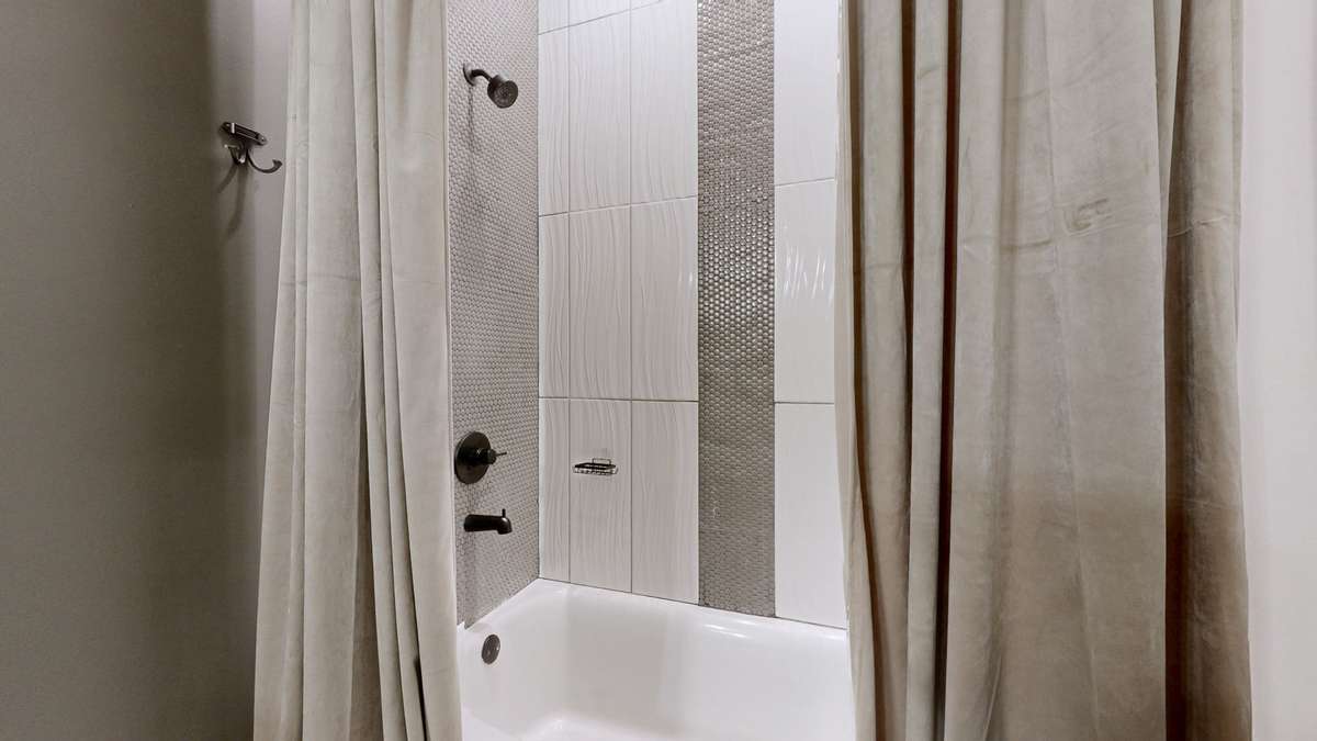 Closer view of the bathtub/shower combination in Bathroom #2.