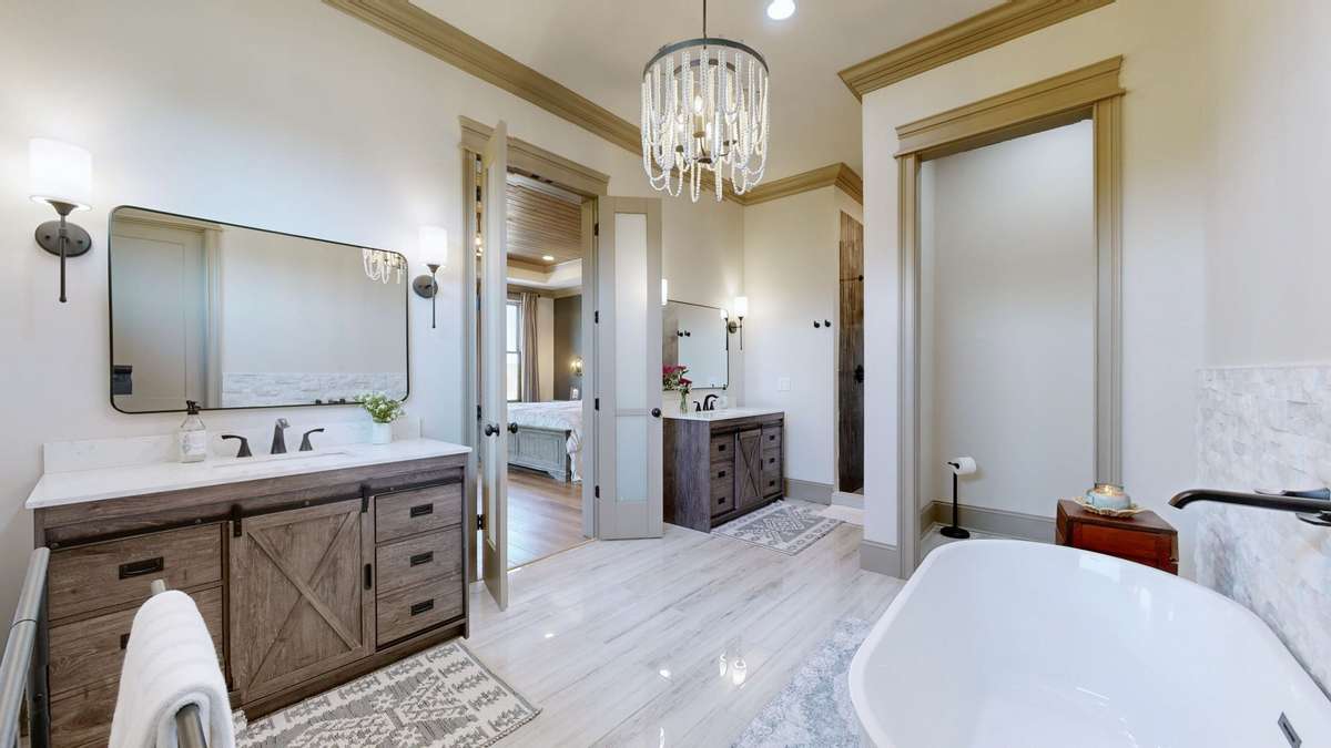 Another view of the Master Bath showing the other Vanity with a sink.   Also the chandellier is very pretty.