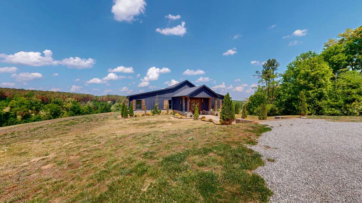 Another view of the land and the house.