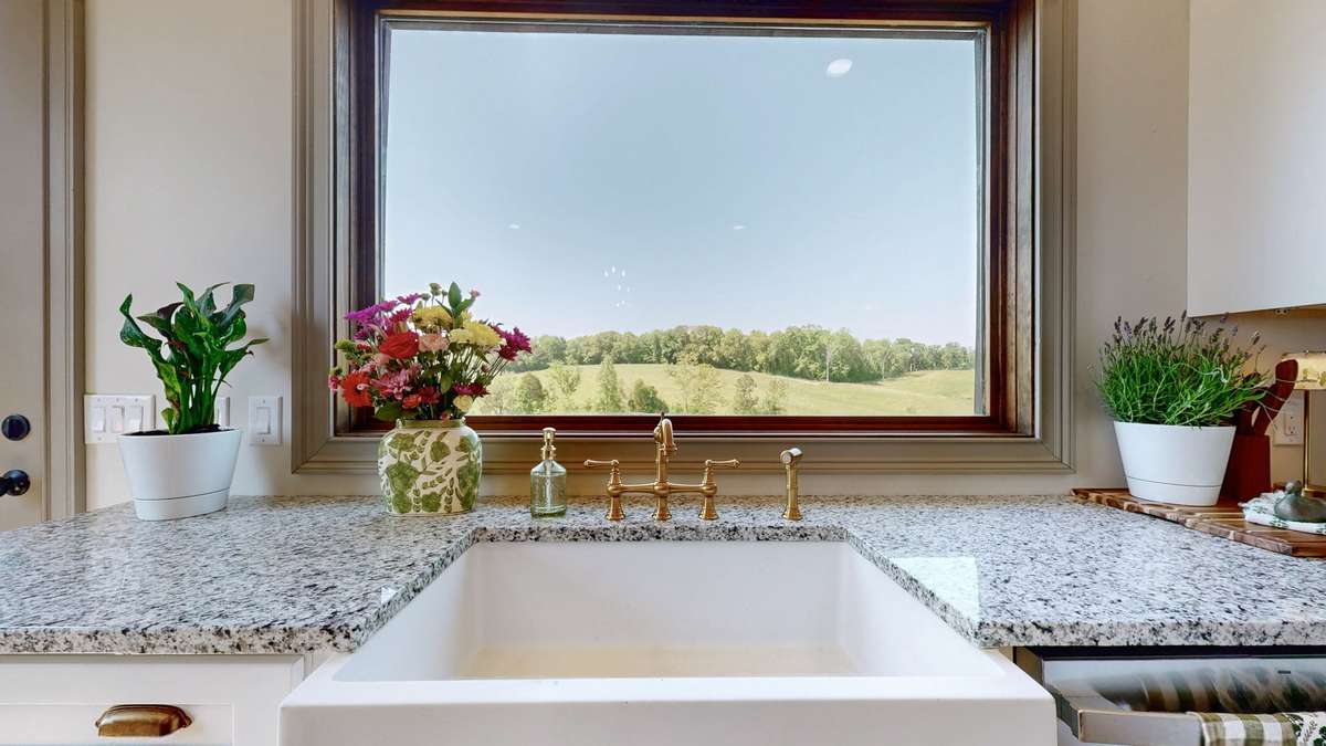 Very nice view... great farm sink for washing those large pots and pans.