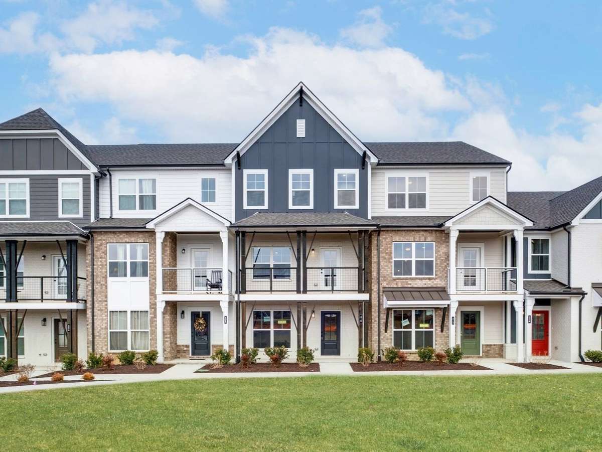 The Ingram features both a front covered porch and covered balcony that span the front of the home. Photos from a previously built Ingram and there is still time to make your own design choices.