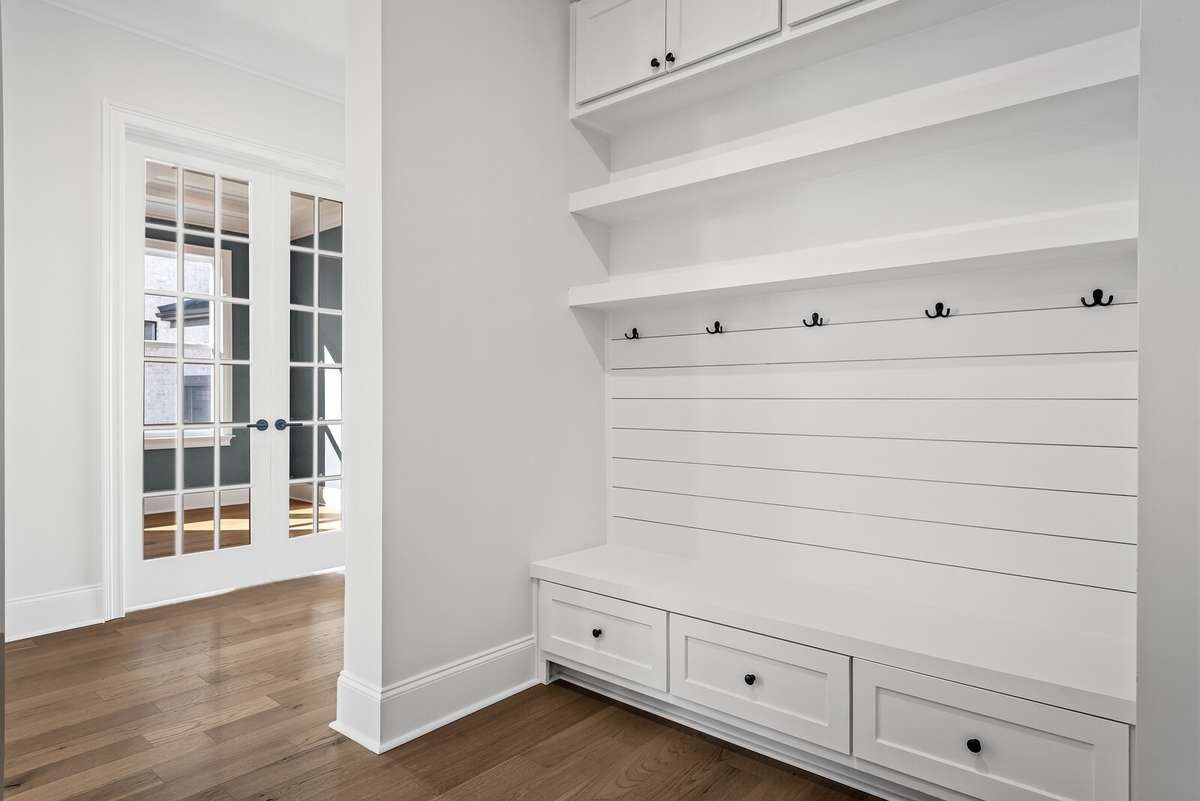This drop zone was upgraded to include drawers and cabinet doors in lieu of cubbies.