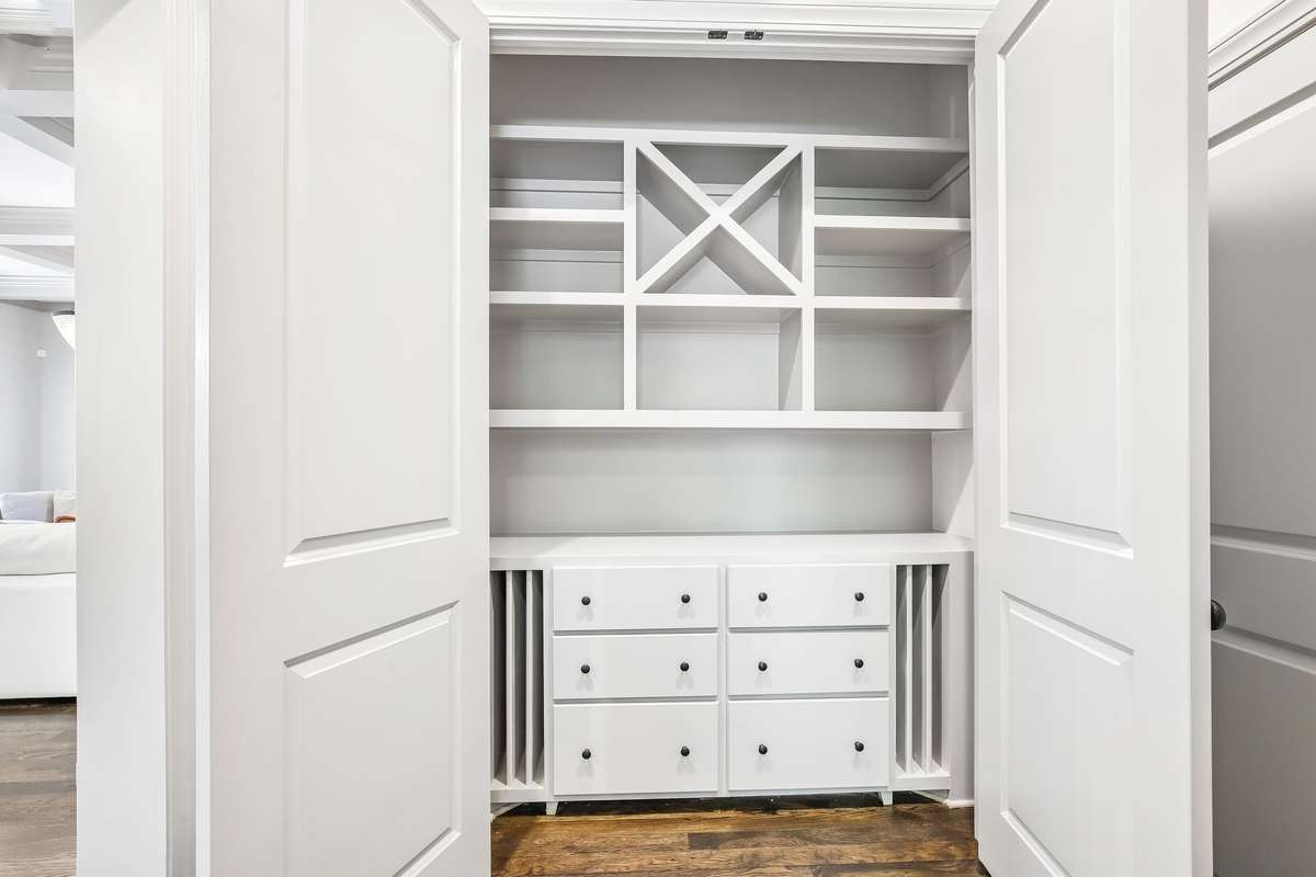 Custom built-ins with shelving and drawer storage