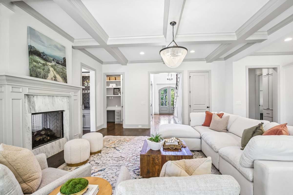 Spacious living area with hardwood floors and seamless flow