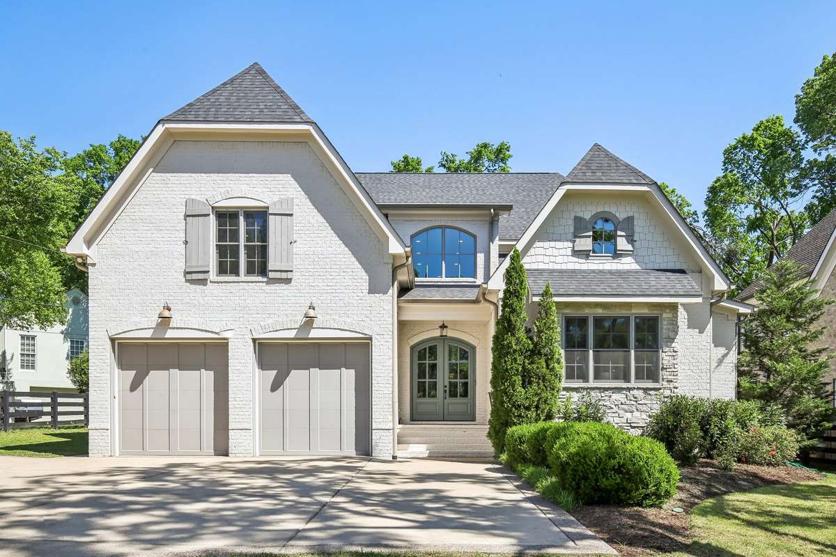 Timeless front exterior with striking curb appeal and a welcoming first impression.