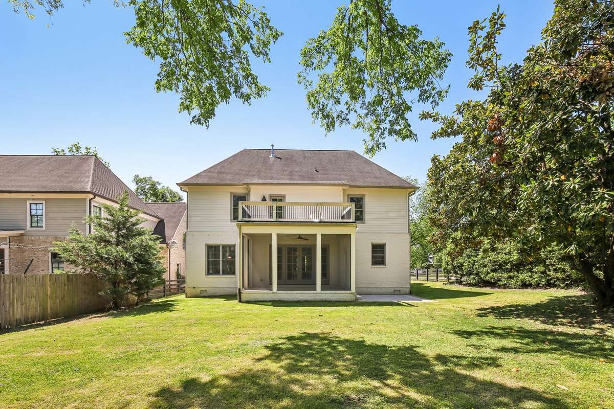 Large, flat backyard with open green space