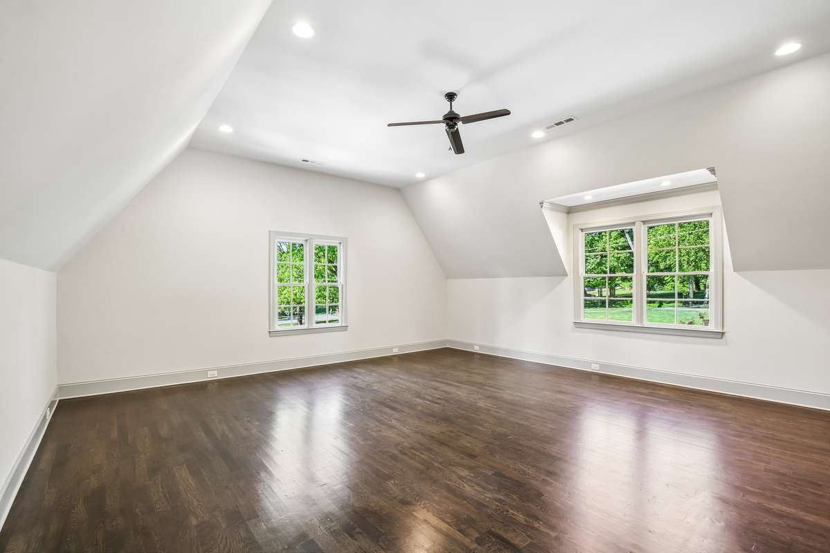 Light-filled bonus room with multiple windows
