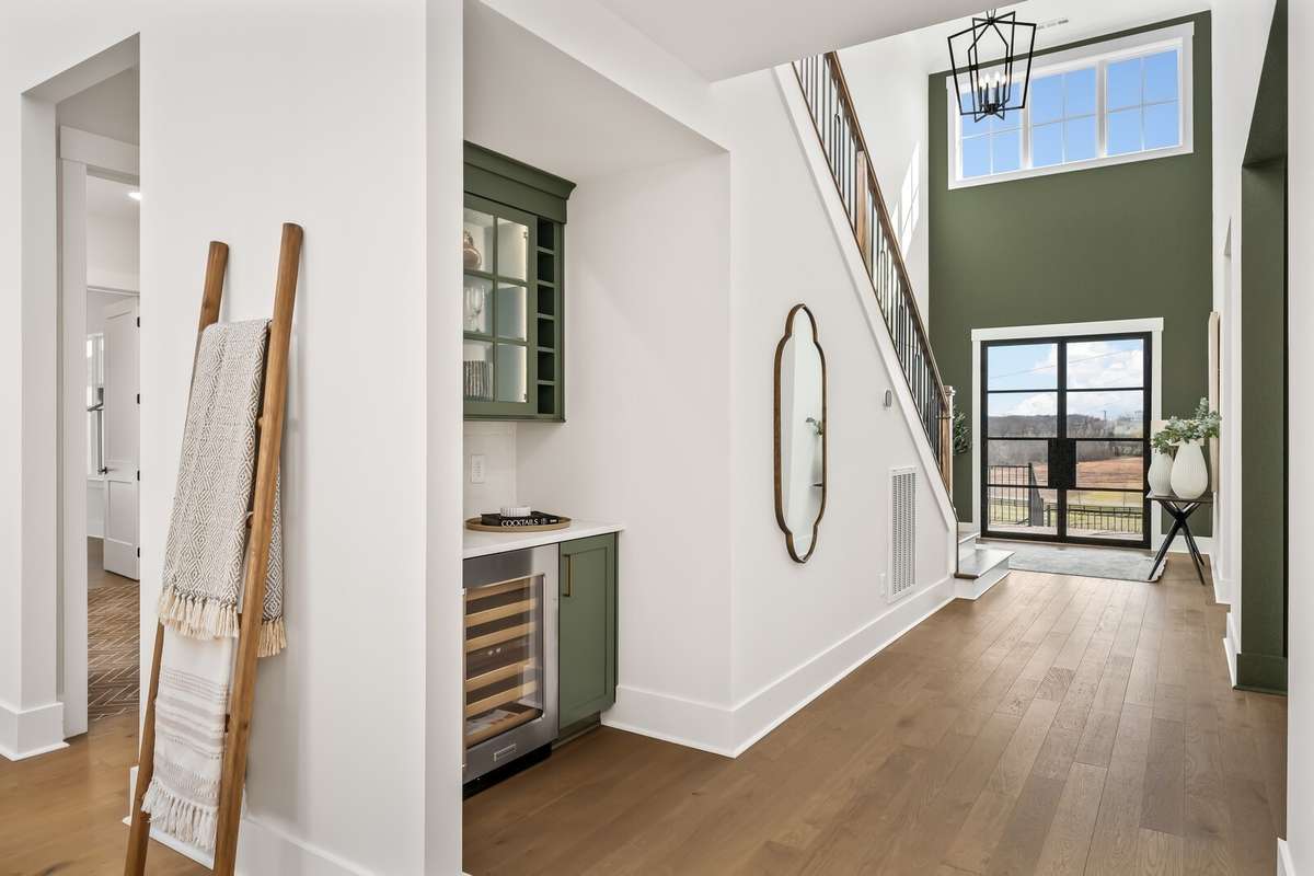 Photos shown are of a previously built Arydale Model Home in another Drees Homes community. Features, finishes, and available options may vary.