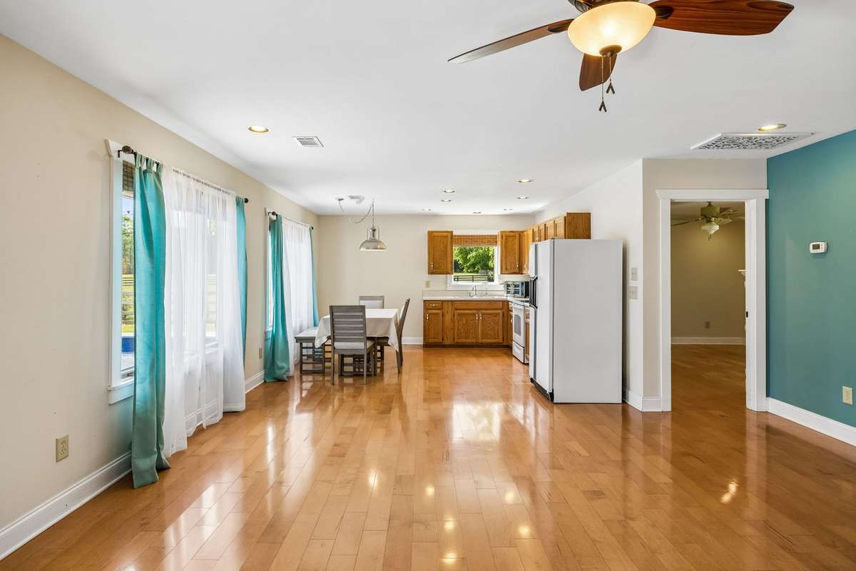 Guest house. Designated dining space with natural light and easy access to kitchen and living areas.