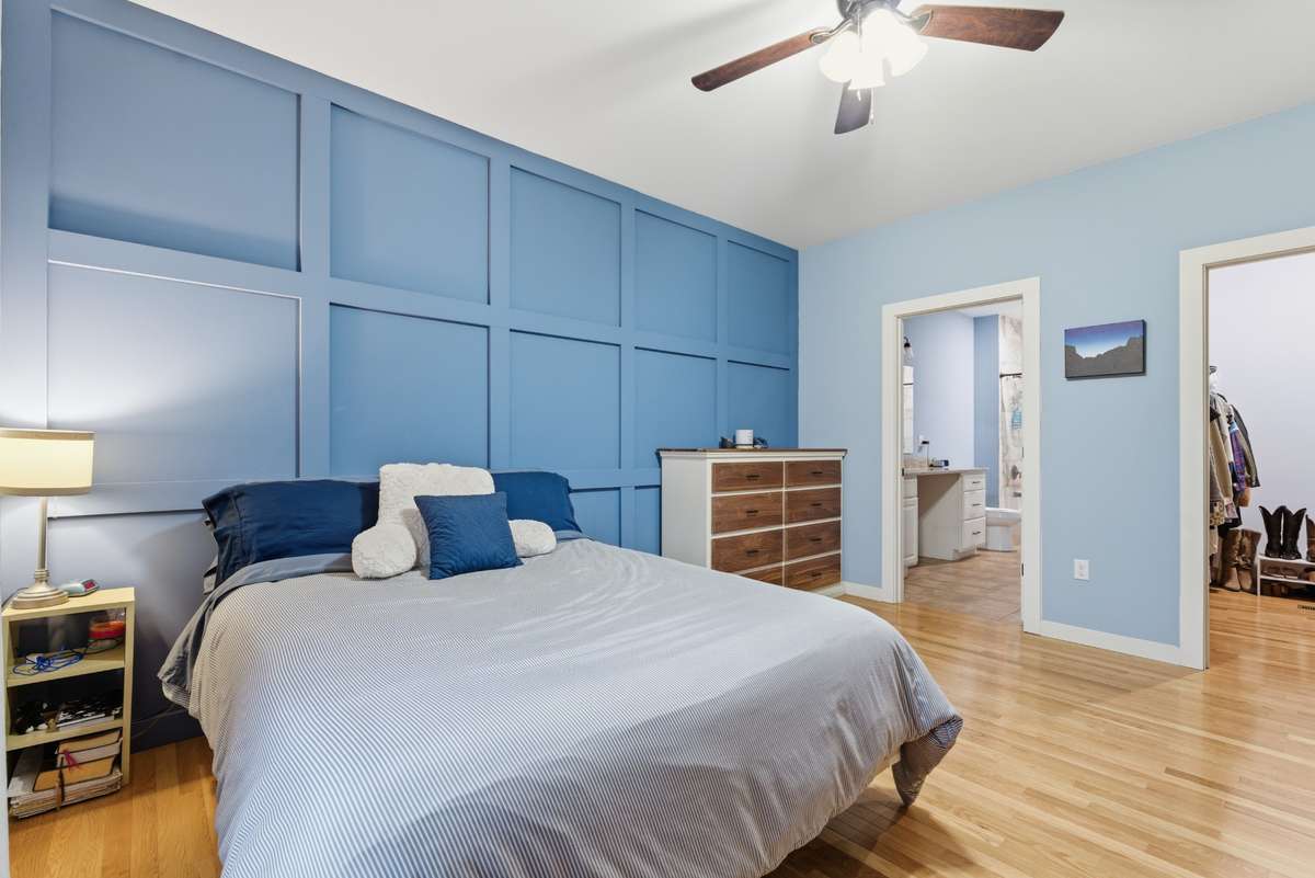 Master bedroom with master bath through door on left and large walk in closet through door on the right.