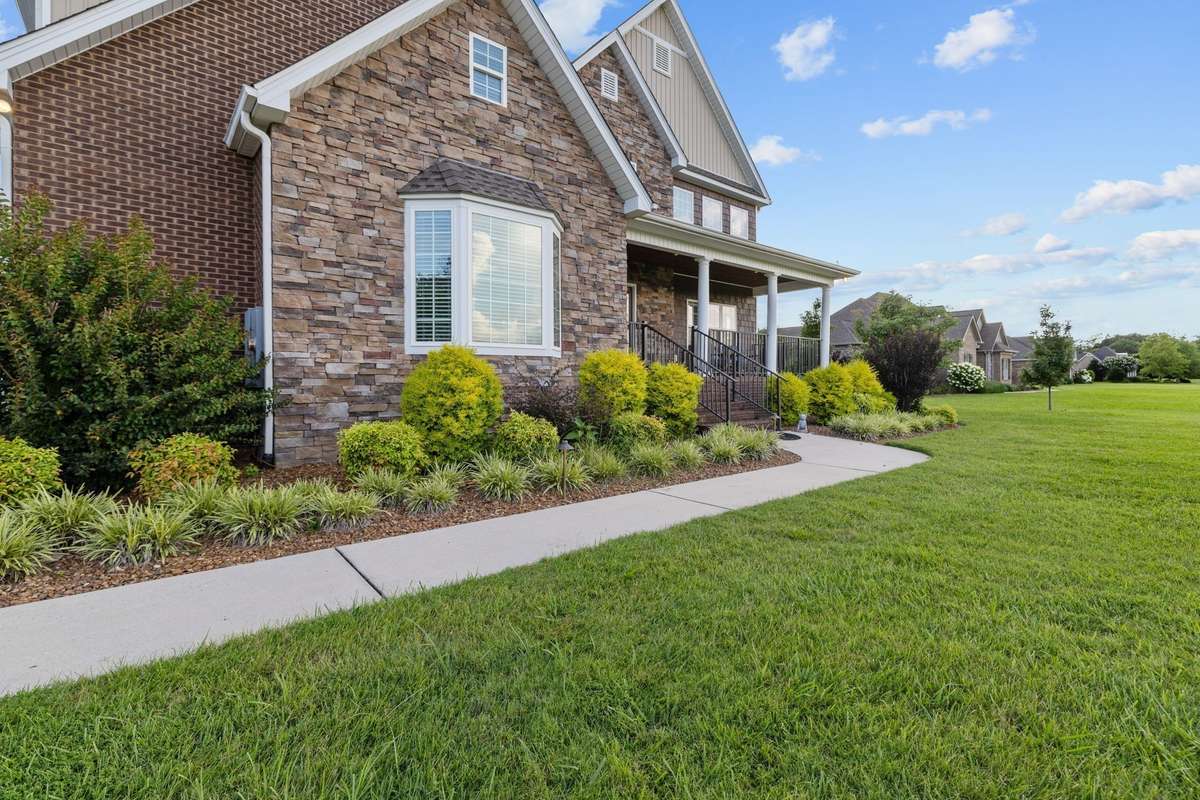 Established and well-maintained lawn and landscaping.